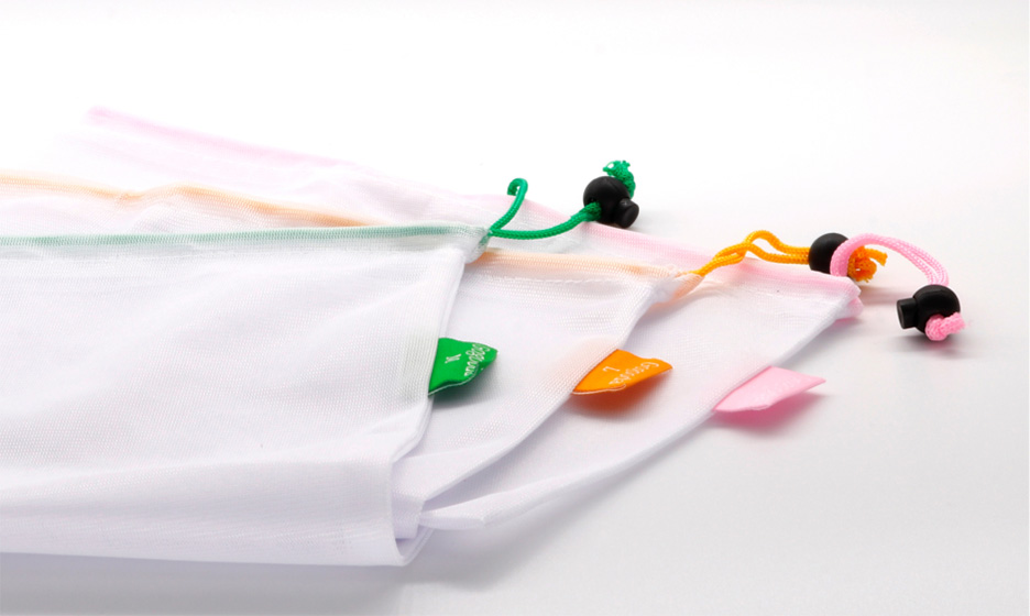 A stack of three reusable bags.